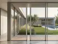 Modern home with large glass doors, perfect for installing mosquiteras and enjoying the garden and pool without insects.