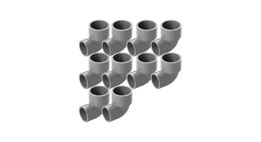 Diez codos de PVC grises, accesorios para tuberías de presión, dispuestos en un patrón escalonado.
