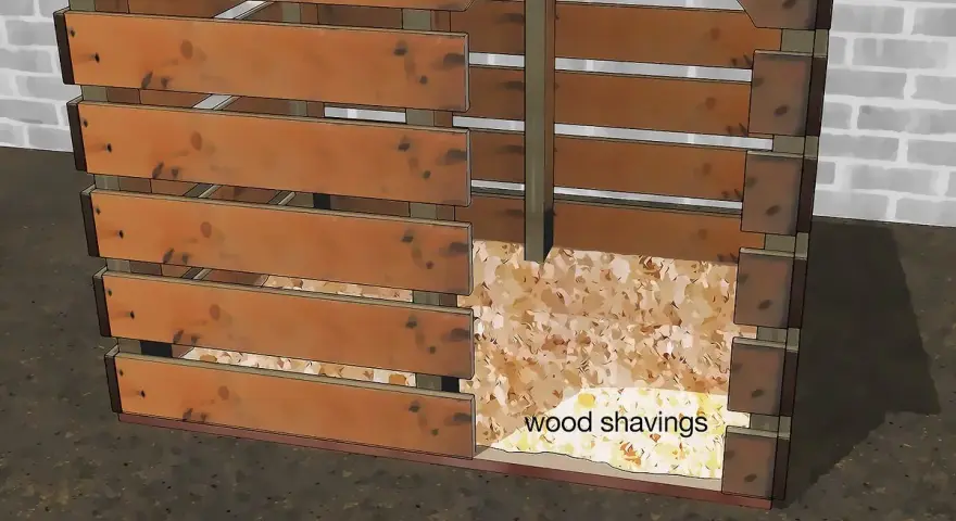 Planos para hacer caseta perro palets. Estructura de madera con entrada arqueada y base cubierta de virutas.